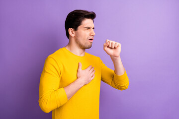 Portrait of young person closed eyes arm on chest coughing feel bad isolated on purple color background