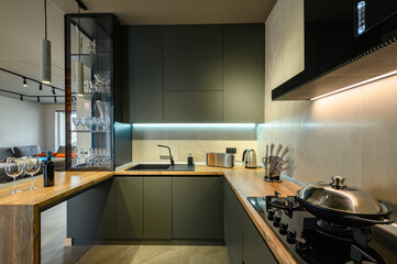 Modern large luxury dark gray kitchen closeup