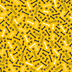 Seamless pattern design with  dog paw traces and bone silhouettes shapes isolated on white background. Vector flat cartoon illustration. For packaging, wrapping paper etc.