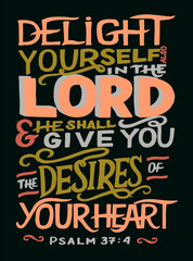 Fototapeta na wymiar Hand lettering wth Bible verse Delight yourself in the Lord on black background