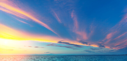 Panorama of seascape with beautiful sky in the evening. Sunset over the sea