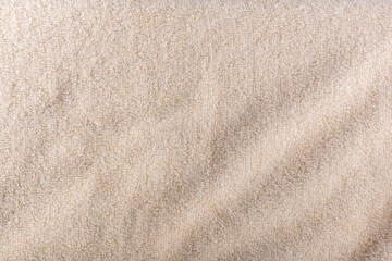Milky white terrycloth background. Milky fabric. Textile surface.