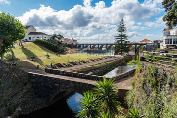 Fototapeta na wymiar Garden with small stream and aqueduct in Ribeira Grande, São Miguel - Azores PORTUGAL