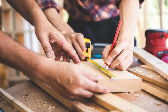 professional carpenters woodworking team work together creatively, creative carpenter working workshop for wooden craftman with wood