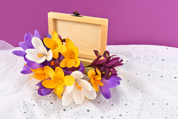 spring flowers in a wooden box