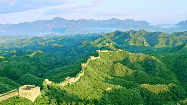 The green Great Wall of China under the sun, a famous landmark in China