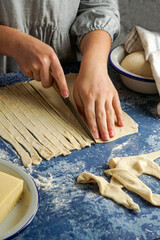 tequeno typical snack of venezuelan food  - woman chef making tequeños or cheese fingers typical venezuelan dish