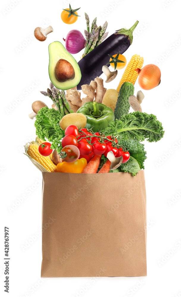 Sticker Paper bag with vegetables on white background. Vegetarian food