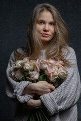 A woman with rose bouquet. High quality photo