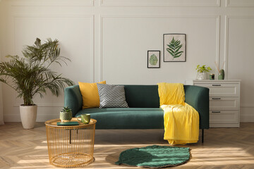 Stylish living room interior with comfortable green sofa - obrazy, fototapety, plakaty