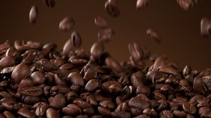 Falling roasted coffee beans