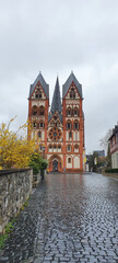 Fototapeta na wymiar Limburg Germany April 2021 Front view of Limburg Cathedral on a rainy spring day