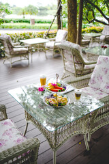 Afternoon tea with mini brioche canapes. Beautiful english afternoon tea ceremony with desserts and snacks