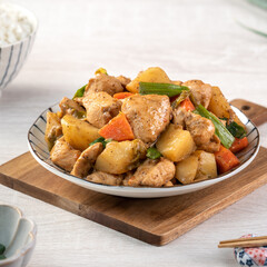 Homemade delicious cubed chicken with braised potato chunks.