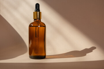 Eco Mineral oil in Amber glass bottles with pipette. Transparent hyaluronic serum gel and skin care concept. Top horizontal view copyspace of dropper glass.