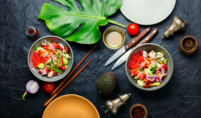 Asian salad of fish caviar,crab sticks and avocado © nikolaydonetsk