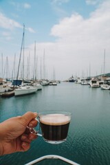 morning coffee with boats in the bay