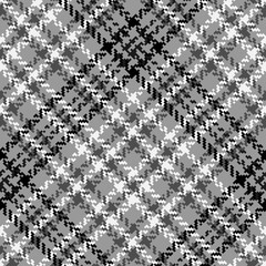 Black and  white plaid pattern a herringbone.
