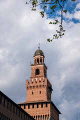 Fototapeta na wymiar Old medieval Sforza Castle ,details of tower in the main entrance, Milan, Italy
