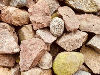 A pile of large stones close up. Top view of various rubble.