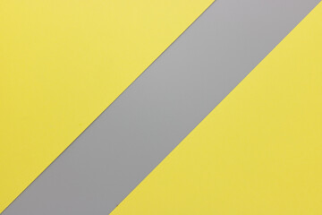 Flat lay. Top view blank yellow and gray paper background with copy space. Trendy theme of color of the year 2021. Ultimate gray and Illuminating. Color paper background. 02