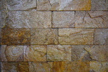 Brown/Golden stone wall texture background