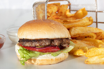 Perfect hamburger classic burger american , tomato and lettuce isolated on a white background