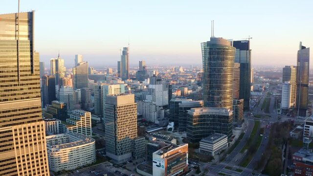drone flight over Warsaw downtown during sunset