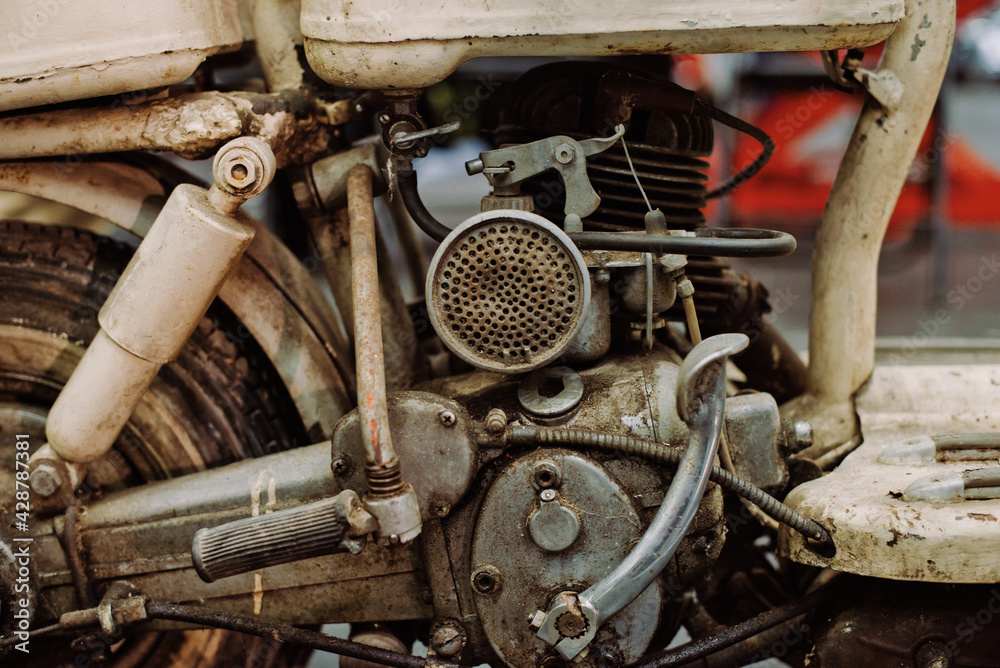 Poster rusty, worn and dirty details of a vintage motorcycle