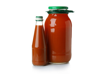 Jar and bottle of carrot juice isolated on white background