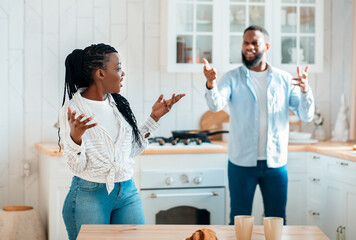 Domestic Fight. Portrait Of Annoyed Black Spouses Emotionally Arguing In Kitchen