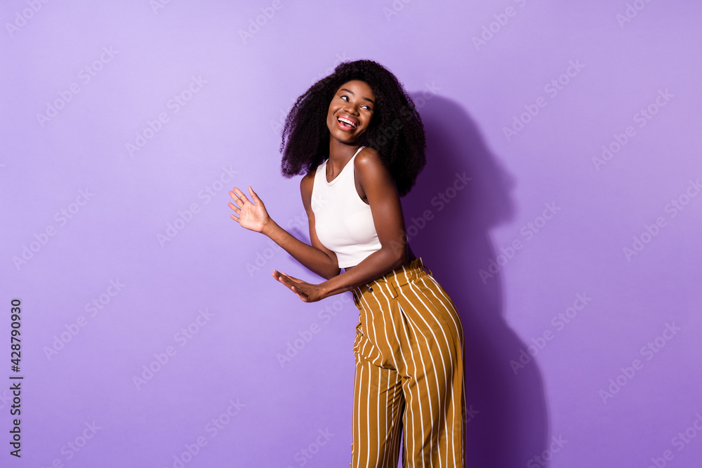 Canvas Prints Portrait of attractive cheerful girl dancing having fun good mood isolated over bright violet purple color background