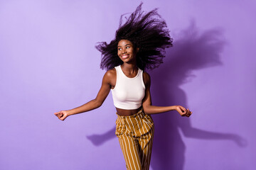 Portrait of attractive cheerful dreamy girl air blowing hair good mood rest isolated over bright...