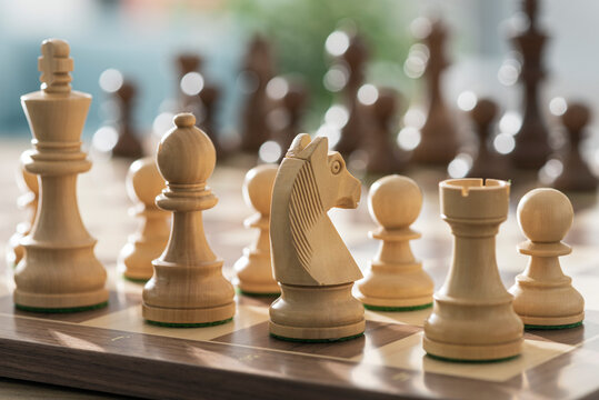 Chess pieces arranged on the chessboard