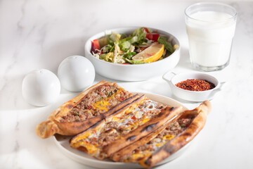 Assorted Turkish foodset. pide with meat , pide with egg, pide mix, lachmajun