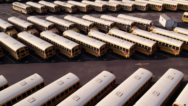 Aerial video school bus parking lot 4k
