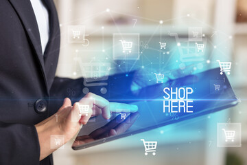 Young person makes a purchase through a tablet