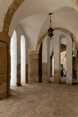 Naklejka premium The arched tunnel under the residential buildings on the west wall in the south part the Temple Mount in the Old Town of Jerusalem in Israel