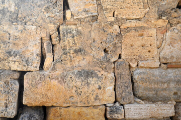 Background of ancient stone wall texture. Part of a stone wall, for background or texture. 