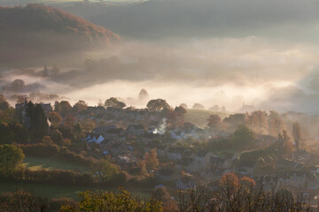 The Cotswold village of Uley, near Stroud, valley and hillsides.