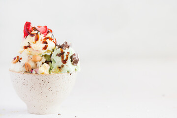 Ice cream with strawberry, peanut, chocolate