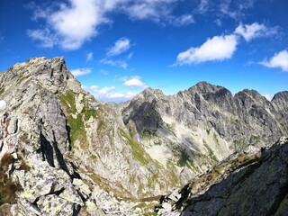 Mountain view from the top peak, with astonishing nature, rocky hills and mountains. 