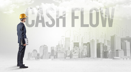 Fototapeta premium Young businessman with hard hat