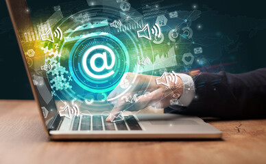 Business hand typing on a modern laptop concept