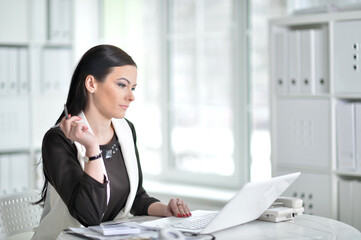 Portrait of  businesswoman working in office