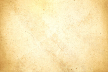 Fototapeta na wymiar Aged texture of old vintage brown parchment paper, can be use as abstract background, wallpaper, webpage, copy space for text.