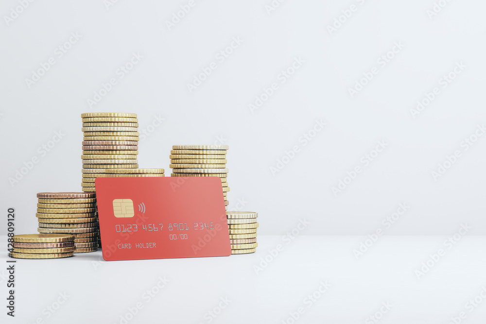 Poster retirement fund and bank deposit concept with red credit card in front of stacks of coins on light s