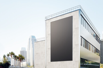 Big black billboard with copyspace for your logo on modern industrial business building wall on sunny city background. 3D rendering, mockup