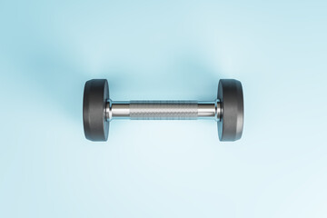 Fototapeta na wymiar Sport and power concept with stylish black dumbbell in the center of light blue surface
