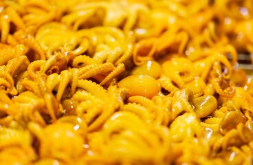 Close up of grilled squid, thai street food market